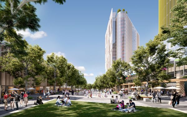 An artist’s impression of the Blacktown Quarter precinct, with people relaxing and picnicing on the grasslands.
